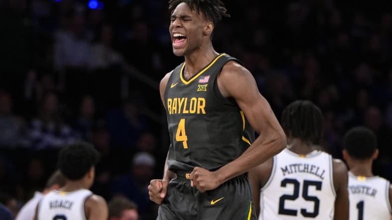 Dec 20, 2023; New York, New York, USA; Baylor Bears guard Ja'Kobe Walter (4) reacts during the second half against the Duke Blue Devils at Madison Square Garden. Mandatory Credit: John Jones-USA TODAY Sports