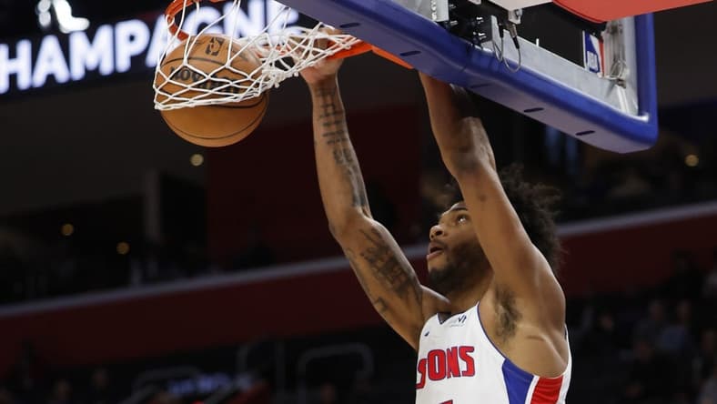Dec 21, 2023; Detroit, Michigan, USA; Detroit Pistons forward Marvin Bagley III (35) dunks in the first half against the Utah Jazz at Little Caesars Arena. Mandatory Credit: Rick Osentoski-USA TODAY Sports
