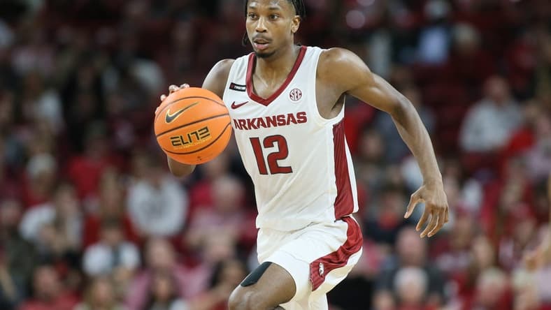 Dec 21, 2023; Fayetteville, Arkansas, USA; Arkansas Razorbacks guard Tramon Mark (12) dribbles in the second half against the Abilene Christian Wildcats at Bud Walton Arena. Arkansas won 83-73. Mandatory Credit: Nelson Chenault-USA TODAY Sports
