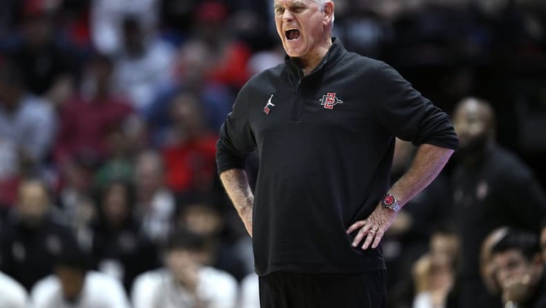 Dec 21, 2023; San Diego, California, USA; San Diego State Aztecs head coach Brian Dutcher yells out during the second half against the Stanford Cardinal at Viejas Arena. Mandatory Credit: Orlando Ramirez-USA TODAY Sports