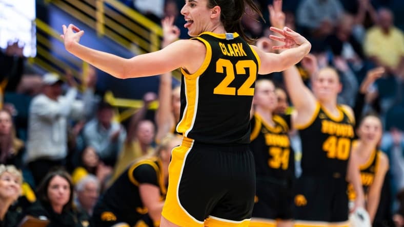 Iowa Hawkeyes guard Caitlin Clark (22) celebrates a three-point basket during the third quarter of the Gulf Coast Showcase championship game against the Kansas State Wildcats at Hertz Arena in Estero on Sunday, Nov. 26, 2023.