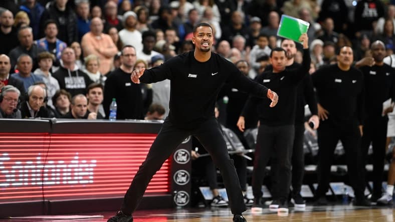 Dec 23, 2023; Providence, Rhode Island, USA; Providence Friars head coach Kim English watches game action against the Butler Bulldogs during the second half at Amica Mutual Pavilion. Mandatory Credit: Eric Canha-USA TODAY Sports