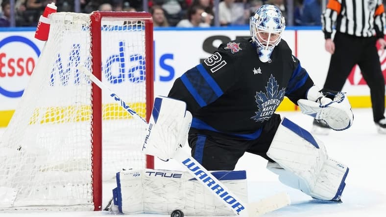 Dec 27, 2023; Toronto, Ontario, CAN; Toronto Maple Leafs goaltender Martin Jones (31) handles the puck against the Ottawa Senators during the second period at Scotiabank Arena. Mandatory Credit: Nick Turchiaro-USA TODAY Sports