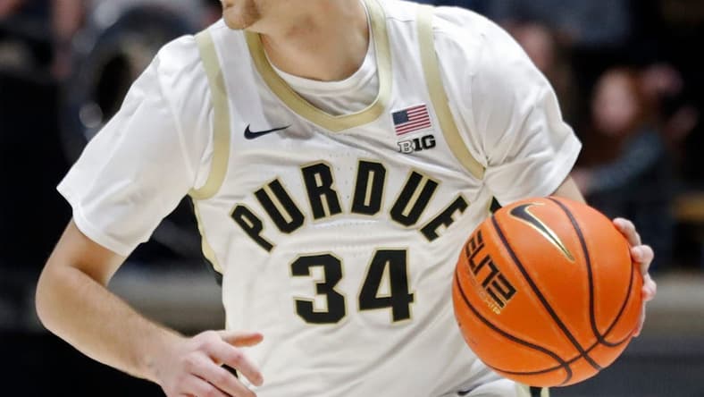 Purdue Boilermakers guard Carson Barrett (34) drives to the basket during the NCAA men   s basketball game against the Eastern Kentucky Colonels, Friday, Dec. 29, 2023, at Mackey Arena in West Lafayette, Ind. Purdue Boilermakers won 80-53.
