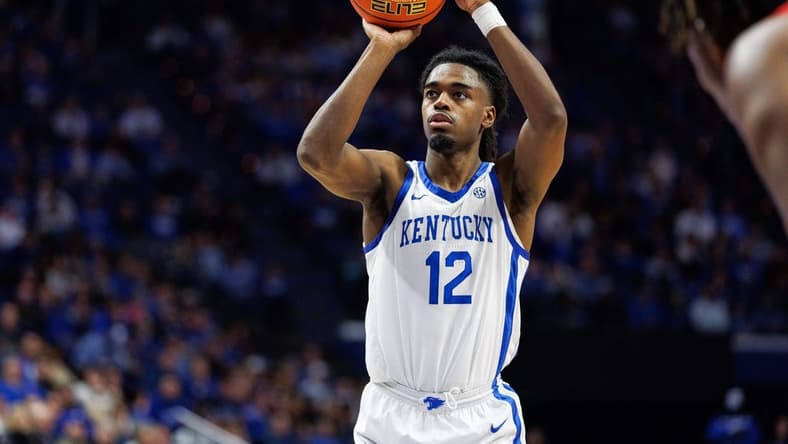 Dec 29, 2023; Lexington, Kentucky, USA; Kentucky Wildcats guard Antonio Reeves (12) shoots a free throw during the second half against the Illinois State Redbirds at Rupp Arena at Central Bank Center. Mandatory Credit: Jordan Prather-USA TODAY Sports