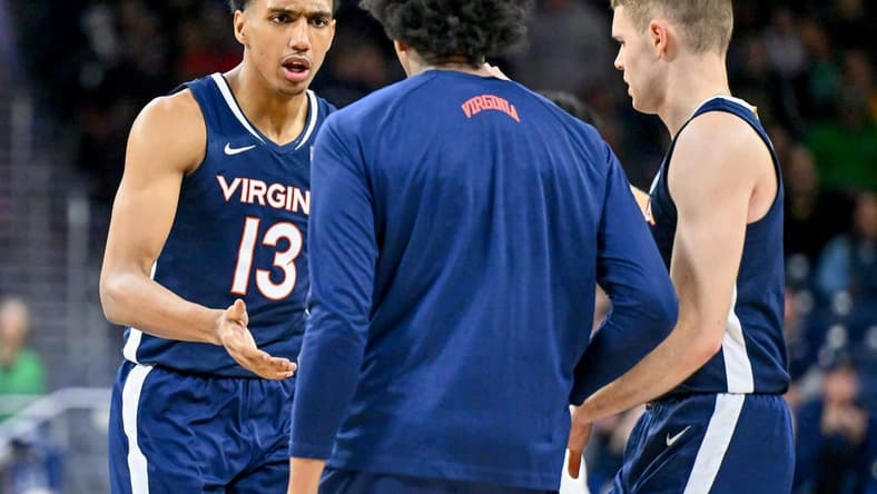 Dec 30, 2023; South Bend, Indiana, USA; Virginia Cavaliers guard Ryan Dunn (13) reacts after a basket in the second half against the Notre Dame Fighting Irish at the Purcell Pavilion. Mandatory Credit: Matt Cashore-USA TODAY Sports