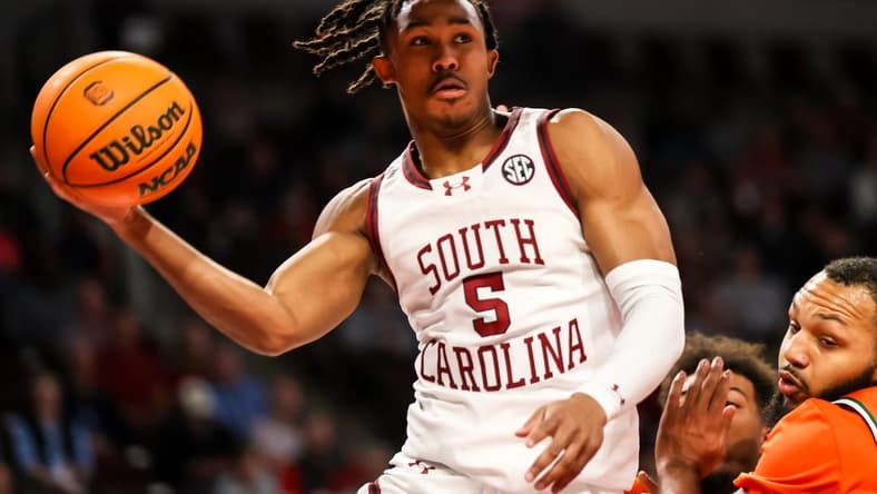 Dec 30, 2023; Columbia, South Carolina, USA; South Carolina Gamecocks guard Meechie Johnson (5) passes against the Florida A&M Rattlers in the first quarter at Colonial Life Arena. Mandatory Credit: Jeff Blake-USA TODAY Sports