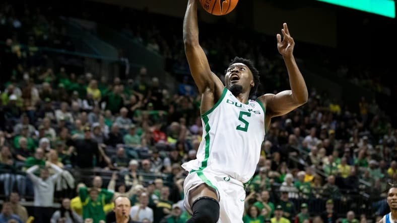 Oregon guard Jermaine Couisnard goes up for a shot as the Oregon Ducks host the UCLA Bruins Saturday, Dec. 30, 2023, at Matthew Knight Arena in Eugene, Ore.