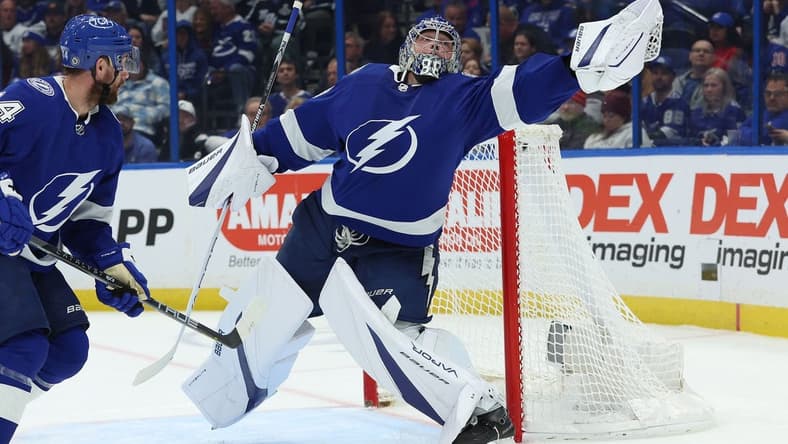 Dec 30, 2023; Tampa, Florida, USA; Tampa Bay Lightning goaltender Andrei Vasilevskiy (88) makes a save against the New York Rangers during the second period at Amalie Arena. Mandatory Credit: Kim Klement Neitzel-USA TODAY Sports