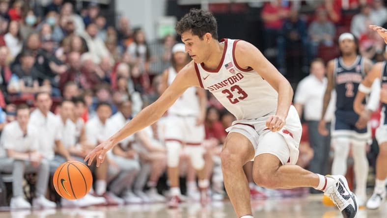 Dec 31, 2023; Stanford, California, USA; Stanford Cardinal forward Brandon Angel (23) reaches for the ball during the second half against the Arizona Wildcats at Maples Pavilion. Mandatory Credit: Stan Szeto-USA TODAY Sports