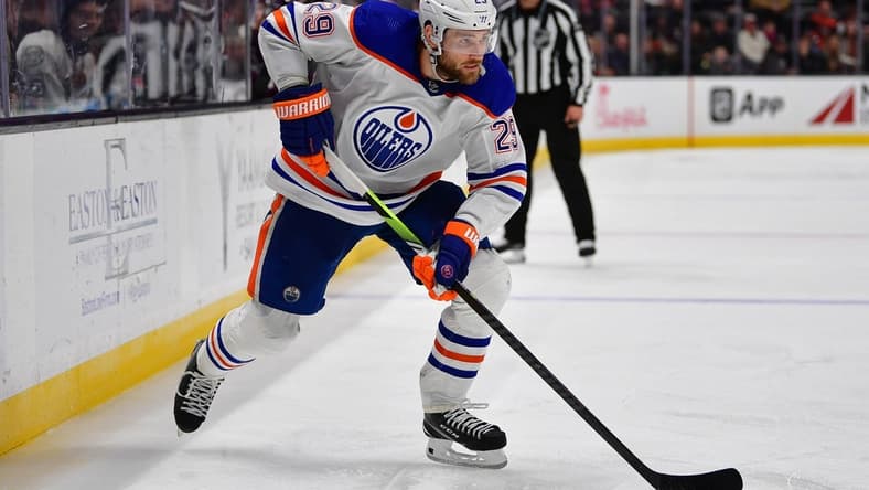 Dec 31, 2023; Anaheim, California, USA; Edmonton Oilers center Leon Draisaitl (29) moves the puck against the Anaheim Ducks during the third period at Honda Center. Mandatory Credit: Gary A. Vasquez-USA TODAY Sports