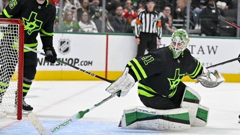 Dec 31, 2023; Dallas, Texas, USA; Dallas Stars goaltender Scott Wedgewood (41) makes a stick save against the Chicago Blackhawks during the third period at the American Airlines Center. Mandatory Credit: Jerome Miron-USA TODAY Sports