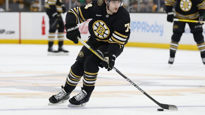 Dec 19, 2023; Boston, Massachusetts, USA; Boston Bruins left wing Jake DeBrusk (74) during the third period against the Minnesota Wild at TD Garden. Mandatory Credit: Winslow Townson-USA TODAY Sports