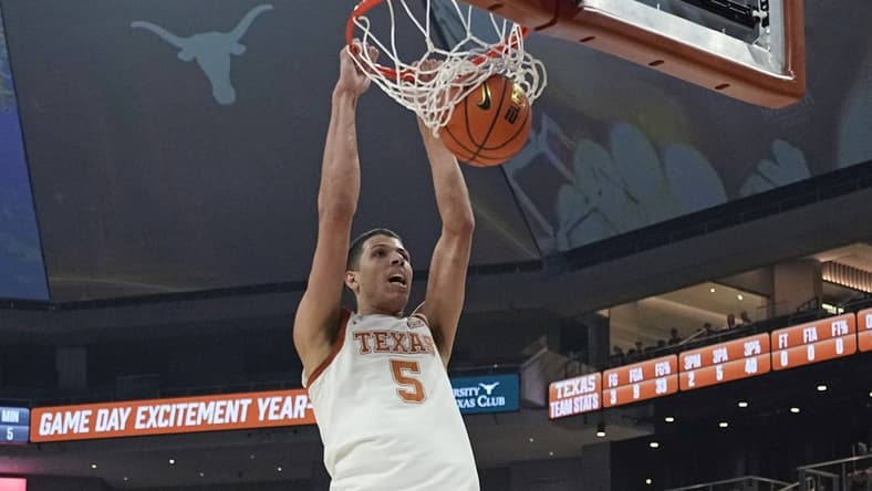Jan 1, 2024; Austin, Texas, USA; Texas Longhorns forward Kadin Shedrick (5) dunks during the first half against the Texas-Arlington Mavericks at Moody Center. Mandatory Credit: Scott Wachter-USA TODAY Sports