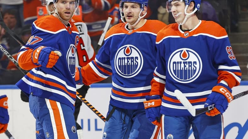 Jan 2, 2024; Edmonton, Alberta, CAN; The Edmonton Oilers celebrate a goal scored by forward Connor McDavid (97) against the Philadelphia Flyers during the first period at Rogers Place. Mandatory Credit: Perry Nelson-USA TODAY Sports