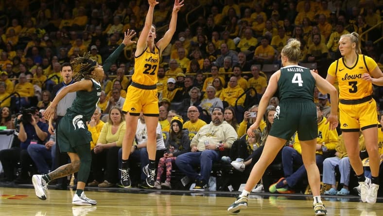 Iowa   s Caitlin Clark (22) attempts a three-point shot against Michigan State Tuesday, Jan. 2, 2024 at Carver-Hawkeye Arena.