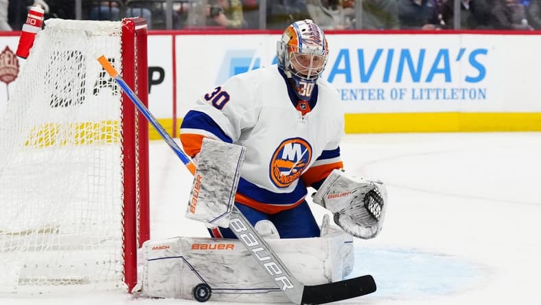 Jan 2, 2024; Denver, Colorado, USA; New York Islanders goaltender Ilya Sorokin (30) makes a pad save in the second period against the Colorado Avalanche at Ball Arena. Mandatory Credit: Ron Chenoy-USA TODAY Sports