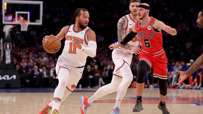 Jan 3, 2024; New York, New York, USA; New York Knicks guard Jalen Brunson (11) drives to the basket against Chicago Bulls guard Alex Caruso (6) during the first quarter at Madison Square Garden. Mandatory Credit: Brad Penner-USA TODAY Sports