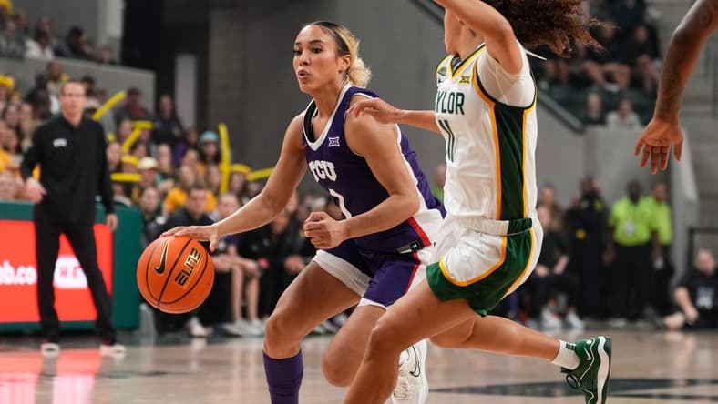 Jan 3, 2024; Waco, Texas, USA;  TCU Horned Frogs guard Jaden Owens (1) controls the ball against Baylor Lady Bears guard Jada Walker (11) during the first half at Paul and Alejandra Foster Pavilion. Mandatory Credit: Chris Jones-USA TODAY Sports