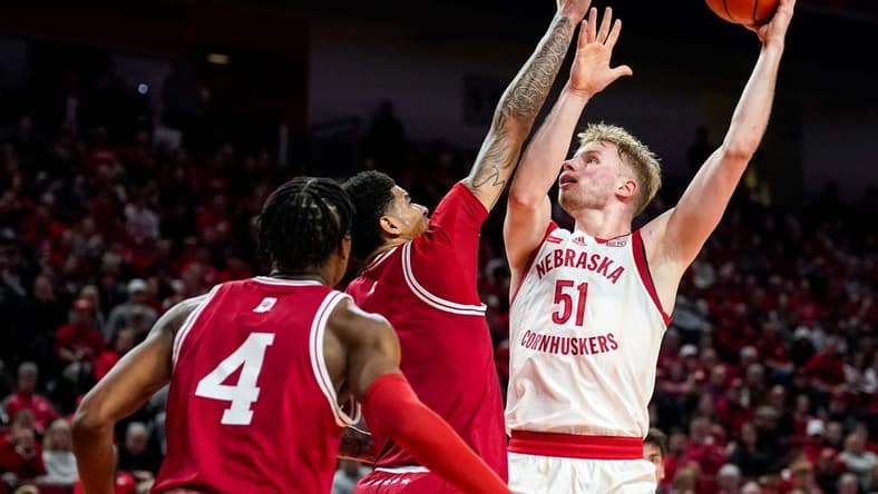 Jan 3, 2024; Lincoln, Nebraska, USA; Nebraska Cornhuskers forward Rienk Mast (51) shoots the ball against Indiana Hoosiers center Kel'el Ware (1) and forward Anthony Walker (4) during the first half at Pinnacle Bank Arena. Mandatory Credit: Dylan Widger-USA TODAY Sports