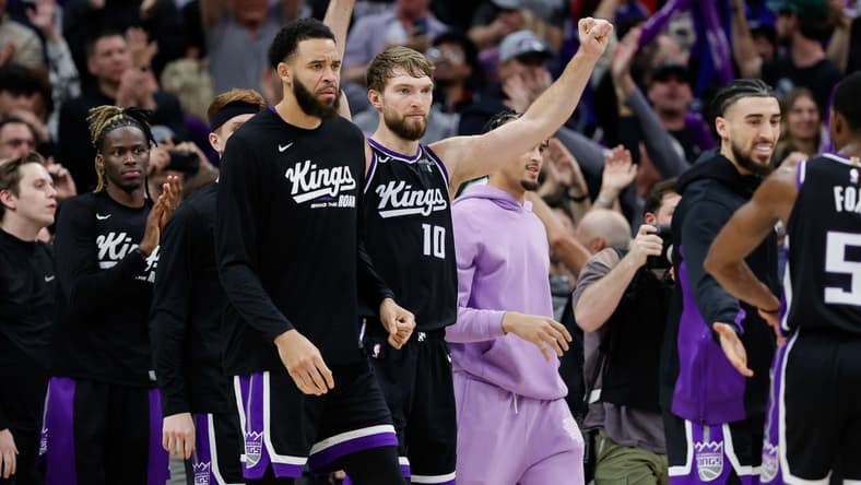 Jan 3, 2024; Sacramento, California, USA; Sacramento Kings forward Domantas Sabonis (10) celebrates after the game against the Orlando Magic at Golden 1 Center. Mandatory Credit: Sergio Estrada-USA TODAY Sports