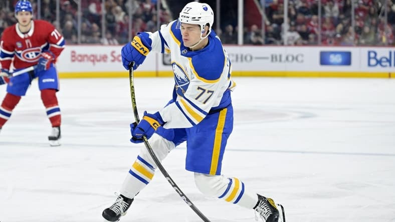 Jan 4, 2024; Montreal, Quebec, CAN; Buffalo Sabres forward JJ Peterka (77) takes a shot on the Montreal Canadiens net during the first period at the Bell Centre. Mandatory Credit: Eric Bolte-USA TODAY Sports