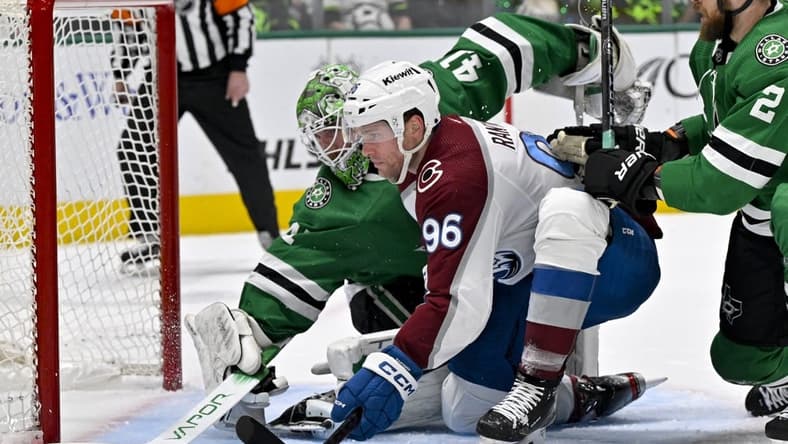 Jan 4, 2024; Dallas, Texas, USA; Dallas Stars goaltender Scott Wedgewood (41) stops a shot by Colorado Avalanche right wing Mikko Rantanen (96) during the first period at the American Airlines Center. Mandatory Credit: Jerome Miron-USA TODAY Sports