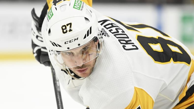 Jan 4, 2024; Boston, Massachusetts, USA; Pittsburgh Penguins center Sidney Crosby (87) gets set for a face off during the second period against the Boston Bruins at TD Garden. Mandatory Credit: Bob DeChiara-USA TODAY Sports