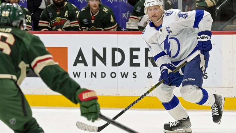 Jan 4, 2024; Saint Paul, Minnesota, USA; Tampa Bay Lightning forward Steven Stamkos (91) controls the puck against the Minnesota Wild during the first period at Xcel Energy Center. Mandatory Credit: Nick Wosika-USA TODAY Sports