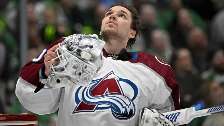 Jan 4, 2024; Dallas, Texas, USA; Colorado Avalanche goaltender Alexandar Georgiev (40) looks up as he puts his helmet back on during a stoppage in play against the Dallas Stars during the second period at the American Airlines Center. Mandatory Credit: Jerome Miron-USA TODAY Sports
