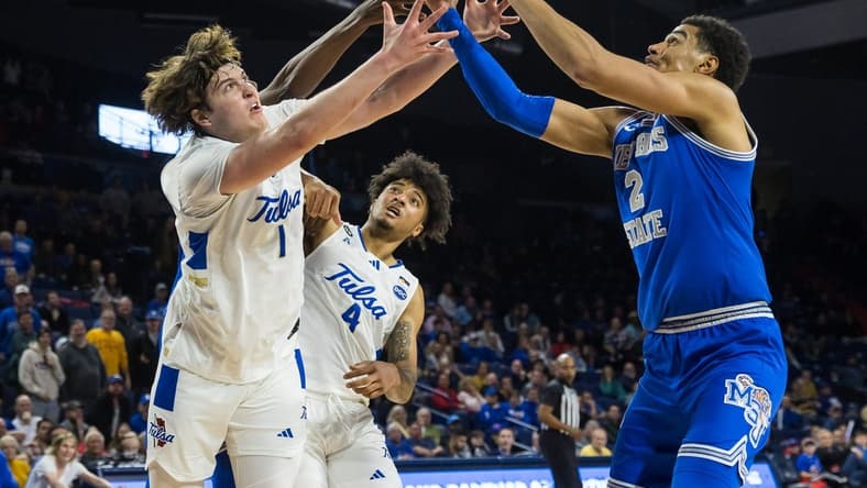 Jan 4, 2024; Tulsa, Oklahoma, USA; Tulsa Golden Hurricane forward Matt Reed (1) and guard PJ Haggerty (4) go for a loose ball against Memphis Tigers forward Nick Jourdain (2) during the second half at the Reynolds Center. The Memphis Tigers won the game 78-75. Mandatory Credit: Brett Rojo-USA TODAY Sports
