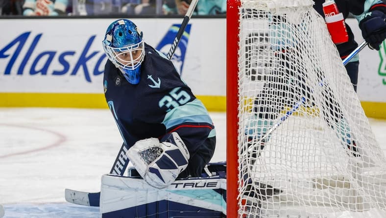 Jan 4, 2024; Seattle, Washington, USA; Seattle Kraken goaltender Joey Daccord (35) reacts to action behind the net during the third period against the Ottawa Senators at Climate Pledge Arena. Mandatory Credit: Joe Nicholson-USA TODAY Sports