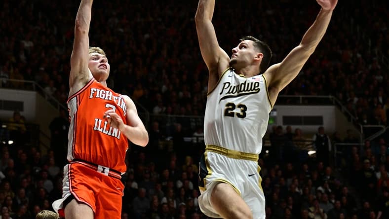 Jan 5, 2024; West Lafayette, Indiana, USA; Illinois Fighting Illini forward Marcus Domask (3) shoots the ball over Purdue Boilermakers forward Camden Heide (23) during the first half at Mackey Arena. Mandatory Credit: Marc Lebryk-USA TODAY Sports
