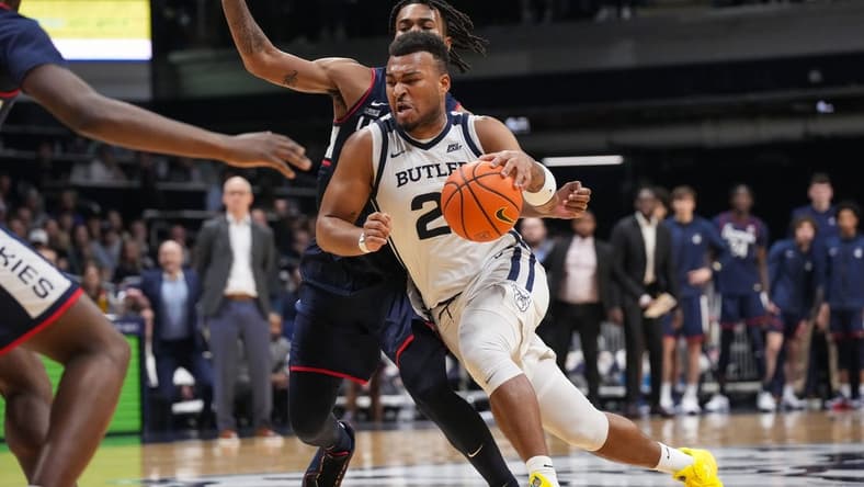 Butler Bulldogs guard Pierre Brooks (21) rushes up the court Friday, Jan. 5, 2024, during the game at Hinkle Fieldhouse in Indianapolis. Butler Bulldogs lost to the Connecticut Huskies, 88-81.