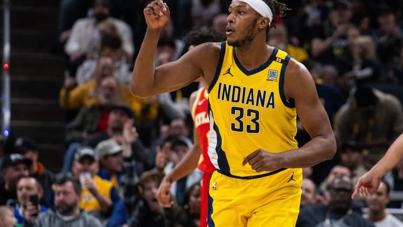 Jan 5, 2024; Indianapolis, Indiana, USA; Indiana Pacers center Myles Turner (33) celebrates a basket in the second half against the Atlanta Hawks at Gainbridge Fieldhouse. Mandatory Credit: Trevor Ruszkowski-USA TODAY Sports