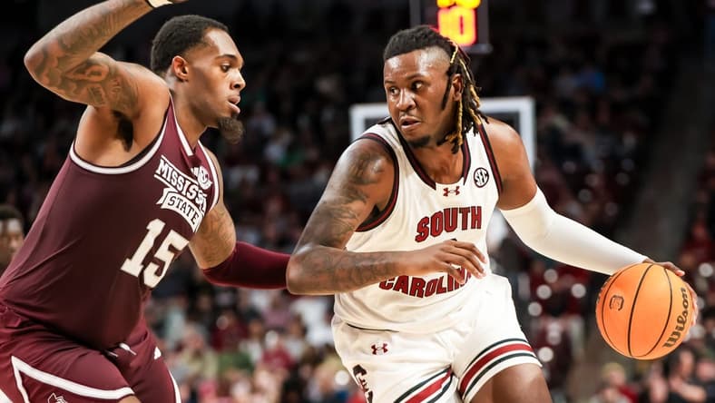 Jan 6, 2024; Columbia, South Carolina, USA; South Carolina Gamecocks forward B.J. Mack (2) drives around Mississippi State Bulldogs forward Jimmy Bell Jr. (15) in the first half at Colonial Life Arena. Mandatory Credit: Jeff Blake-USA TODAY Sports