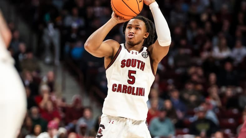 Jan 6, 2024; Columbia, South Carolina, USA; South Carolina Gamecocks guard Meechie Johnson (5) attempts a three point basket ams in the first half at Colonial Life Arena. Mandatory Credit: Jeff Blake-USA TODAY Sports