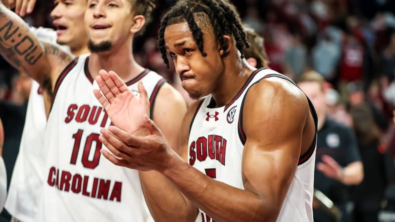 Jan 6, 2024; Columbia, South Carolina, USA; South Carolina Gamecocks guard Meechie Johnson (5) celebrates with this teammates following their victory over the Mississippi State Bulldogs at Colonial Life Arena. Mandatory Credit: Jeff Blake-USA TODAY Sports