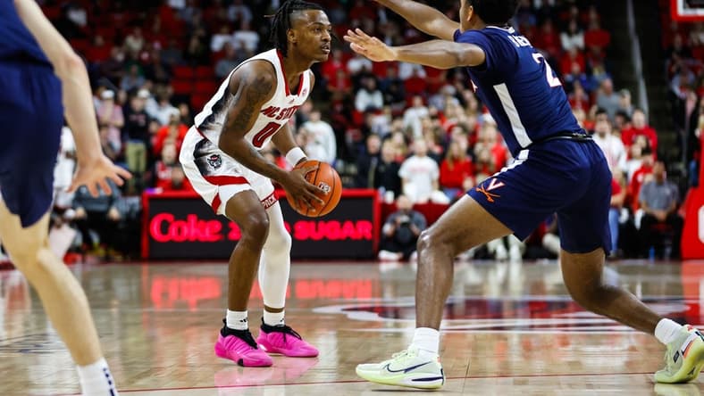 Jan 6, 2024; Raleigh, North Carolina, USA; North Carolina State Wolfpack guard DJ Horne (0) with the ball during the first half against Virginia Cavaliers at PNC Arena. Mandatory Credit: Jaylynn Nash-USA TODAY Sports