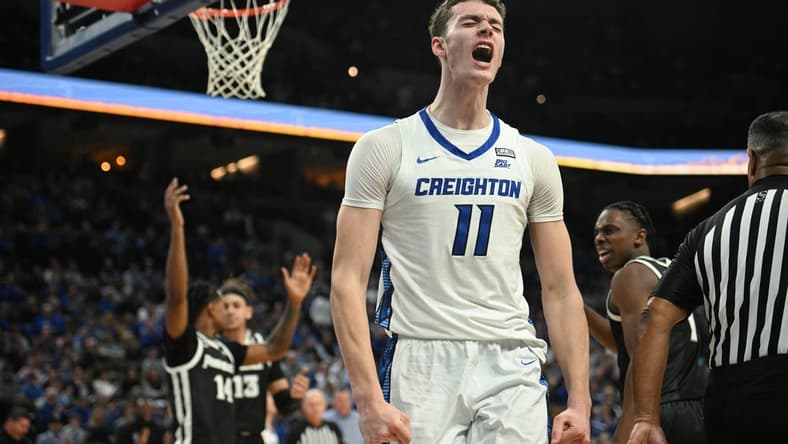 Jan 6, 2024; Omaha, Nebraska, USA; Creighton Bluejays center Ryan Kalkbrenner (11) reacts after scoring and being fouled against the Providence Friars in the second half at CHI Health Center Omaha. Mandatory Credit: Steven Branscombe-USA TODAY Sports