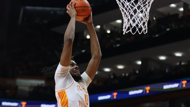 Jan 6, 2024; Knoxville, Tennessee, USA; Tennessee Volunteers forward Jonas Aidoo (0) dunks the ball against the Mississippi Rebels during the first half at Thompson-Boling Arena at Food City Center. Mandatory Credit: Randy Sartin-USA TODAY Sports