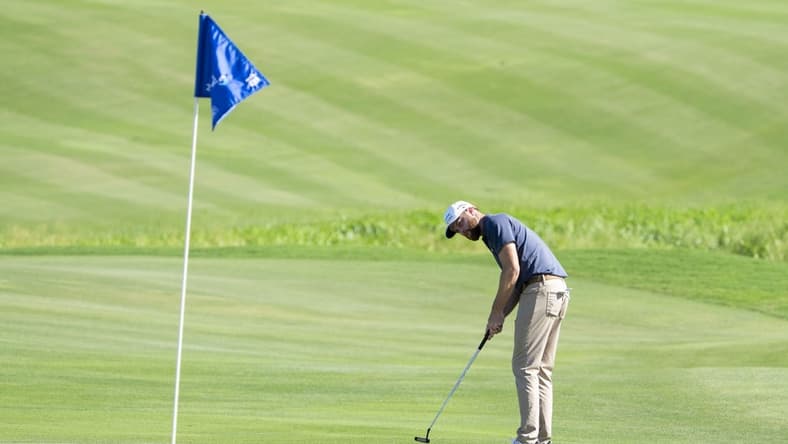 January 6, 2024; Maui, Hawaii, USA; Chris Kirk putts on the 18th hole during the third round of The Sentry golf tournament at Kapalua Golf - The Plantation Course. Mandatory Credit: Kyle Terada-USA TODAY Sports