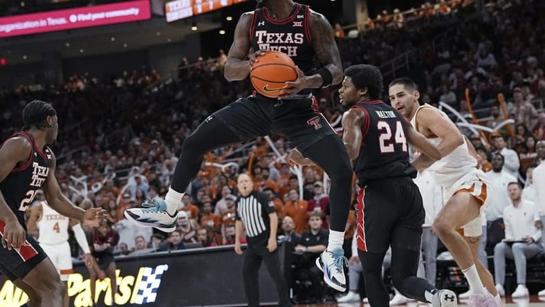 Jan 6, 2024; Austin, Texas, USA; Texas Tech Red Raiders guard Joe Toussaint (6) grabs a rebound during the first half against the Texas Longhorns at Moody Center. Mandatory Credit: Scott Wachter-USA TODAY Sports