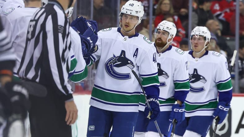 Jan 6, 2024; Newark, New Jersey, USA; Vancouver Canucks center Elias Pettersson (40) celebrates his goal against the New Jersey Devils during the second period at Prudential Center. Mandatory Credit: Ed Mulholland-USA TODAY Sports