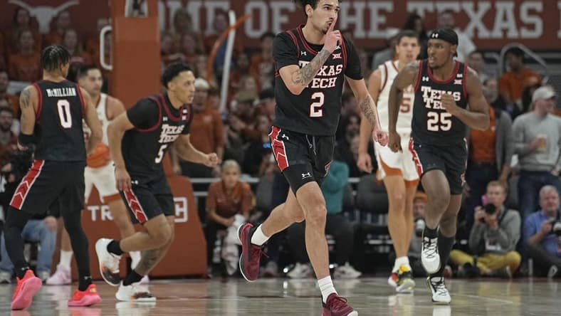 Jan 6, 2024; Austin, Texas, USA; Texas Tech Red Raiders guard Pop Isaacs (2) reacts after scoring a three point basket during the first half against the Texas Longhorns at Moody Center. Mandatory Credit: Scott Wachter-USA TODAY Sports