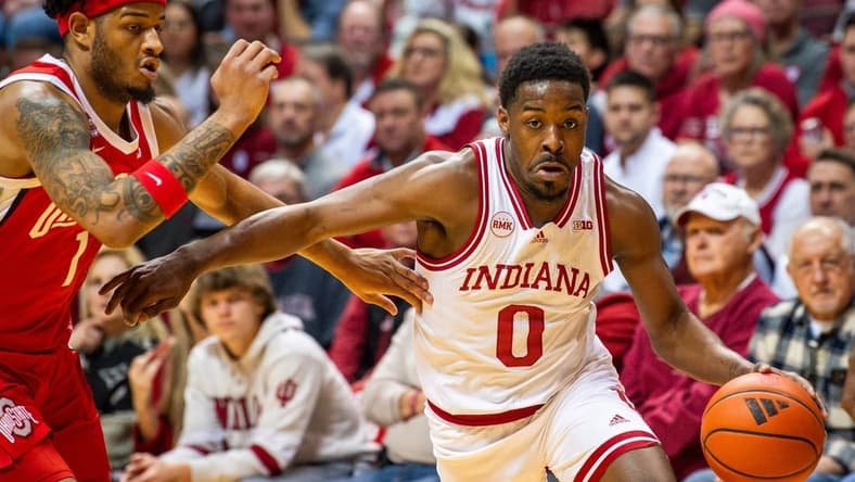 Indiana's Xavier Johnson (0) drives past Ohio State's Roddy Gayle Jr. (1) during the first half of the Indiana versus Ohio State men's basketball game at Simon Skjodt Assembly Hall on Saturday, Jan. 6, 2024.