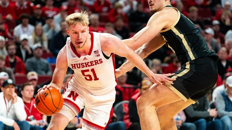 Jan 9, 2024; Lincoln, Nebraska, USA; Nebraska Cornhuskers forward Rienk Mast (51) drives against Purdue Boilermakers center Zach Edey (15) during the first half at Pinnacle Bank Arena. Mandatory Credit: Dylan Widger-USA TODAY Sports