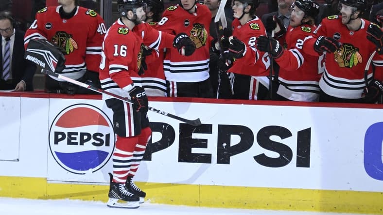 Jan 9, 2024; Chicago, Illinois, USA;  Chicago Blackhawks center Jason Dickinson (16) celebrates with teammates after he scores against the Edmonton Oilers during the first period at the United Center. Mandatory Credit: Matt Marton-USA TODAY Sports