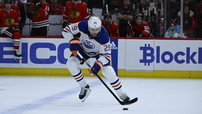 Jan 9, 2024; Chicago, Illinois, USA;  Edmonton Oilers center Leon Draisaitl (29) moves the puck against the Chicago Blackhawks during the first period at the United Center. Mandatory Credit: Matt Marton-USA TODAY Sports