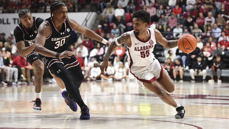 Jan 9, 2024; Tuscaloosa, Alabama, USA; South Carolina forward Collin Murray-Boyles (30) guards Alabama guard Aaron Estrada during the game Coleman Coliseum. Mandatory Credit: Gary Cosby Jr.-USA TODAY Sports